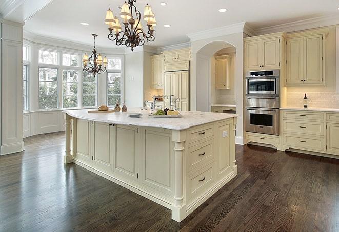 newly installed grey laminate floors in modern kitchen in Perry